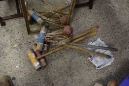 FOUR CROQUET MALLETS WITH HOOPS AND BALL