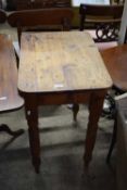 SMALL STAINED PINE SIDE TABLE ON TURNED LEGS, 61CM WIDE