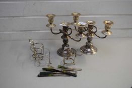 MIXED LOT: PAIR OF SILVER PLATED CANDELABRA, SILVER PLATED CUP HOLDERS AND QUANTITY OF BUTTER