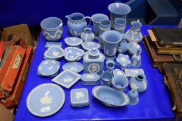 LARGE COLLECTION OF WEDGWOOD BLUE JASPERWARES TO INCLUDE VASES, JUGS, TEA CANISTER, VARIOUS PIN