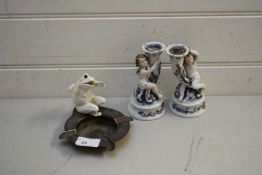 PAIR OF CONTINENTAL FIGURAL CANDLESTICKS AND A SMALL ASHTRAY WITH FROG DECORATION (3)