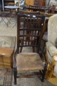 19TH CENTURY SPINDLE BACK AND RUSH SEATED CARVER ARMCHAIR