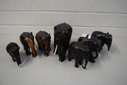 SEVEN VARIOUS EBONY ELEPHANTS