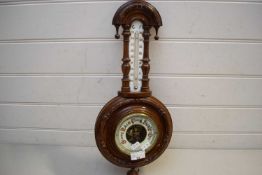 LATE VICTORIAN AMERICAN WALNUT FRAMED ANEROID BAROMETER AND THERMOMETER COMBINATION