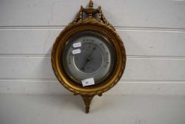 EARLY 20TH CENTURY ANEROID BAROMETER SET IN A GILT FINISH FRAME