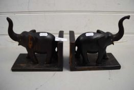 PAIR OF HARDWOOD BOOKENDS FORMED AS ELEPHANTS