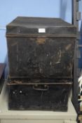 TWO BLACK PAINTED METAL DEED BOXES OR TRUNKS, APPROX 60CM WIDE (2)