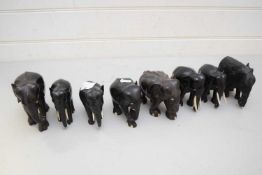 COLLECTION OF EIGHT VARIOUS EBONY ELEPHANTS