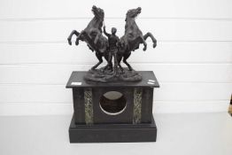 VICTORIAN BLACK SLATE AND MARBLE MOUNTED CLOCK CASE WITH APPLIED SPELTER DECORATION OF MAN WITH