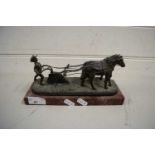 BRONZED METAL MODEL OF A PLOUGHMAN WITH TWO HORSES RAISED ON A MARBLE PLINTH BASE