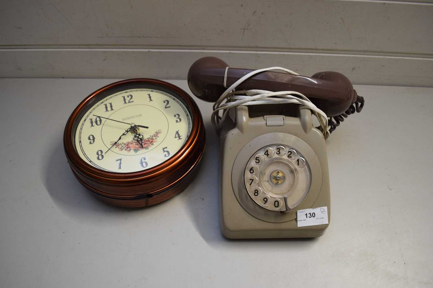 VINTAGE PLASTIC TELEPHONE TOGETHER WITH A MODERN DOUBLE SIDED QUARTZ CLOCK