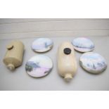 TWO STONEWARE HOT WATER BOTTLES AND A COLLECTION OF COALPORT ROMANCE OF THE NORFOLK BROADS PLATES