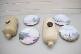 TWO STONEWARE HOT WATER BOTTLES AND A COLLECTION OF COALPORT ROMANCE OF THE NORFOLK BROADS PLATES