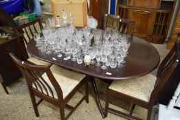 STAG MINSTREL EXTENDING DINING TABLE AND FOUR CHAIRS