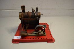 SMALL MAMOD ENGINE ON RED METAL STAND