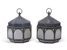 Pair of early 20th century octagonal metal lanterns, the sides set with frosted opaque glass