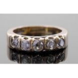 18ct gold five stone diamond ring featuring five old brilliant cut diamonds, individually claw set