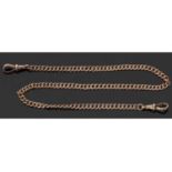 9ct gold curb link chain suspending two clips at either end, 37cm long, g/s 10.2gms
