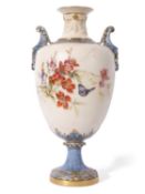 Large Royal Worcester vase decorated with flowers and butterflies by Edward Raby, above a blue and