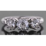 Three stone diamond ring featuring three graduated round old cut diamonds, total ct wt 0.70ct