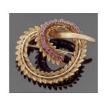 18ct gold and ruby set brooch, an entwined garland design having chased and engraved detail,