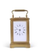 Late 19th/early 20th century French brass and glass cased carriage clock of canted rectangular