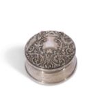 Elizabeth II silver encased ring box of slightly tapering circular form, the lid well embossed