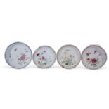 Group of four Chinese porcelain saucers, Yongzheg early Qianlong period, all with polychrome designs