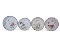 Group of four Chinese porcelain saucers, Yongzheg early Qianlong period, all with polychrome designs