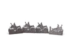 Of equestrian interest - a fine set of four late Victorian silver menu holders in the form of horses