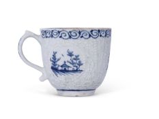 Early Lowestoft porcelain cup, the body moulded with lattice and flower heads encompassing blue