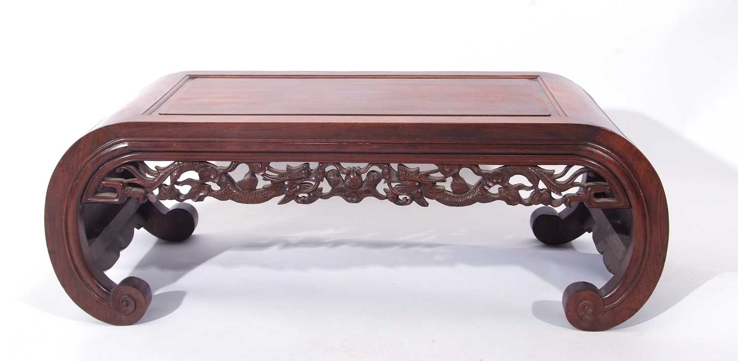 Chinese hardwood low table with swept incurving ends decorated with carved and fretwork detail, 33 x - Image 2 of 5