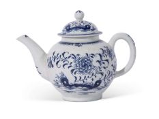 Lowestoft tea pot and cover decorated in underglaze blue with a root pattern and flowering plants,