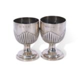 Pair of early George III silver goblets of plain circular form with wavy edged fluting and plain