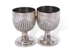 Pair of early George III silver goblets of plain circular form with wavy edged fluting and plain