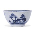 Early Lowestoft porcelain tea bowl, painted in blue with a house and trees and sailing ship, the