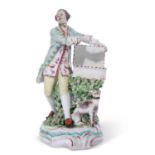 Derby patchmark sweetmeat figure circa 1765 modelled as a gentleman with a dog by his side, 22cm