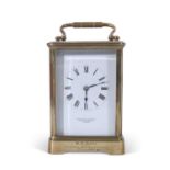 First quarter of the 20th century large French brass and glass panelled carriage clock of plain