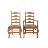 Set of eight reproduction oak ladderback and rush seated dining chairs with cabriole legs and turned