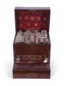 19th century mahogany travelling apothecary case of hinged rectangular form containing a selection