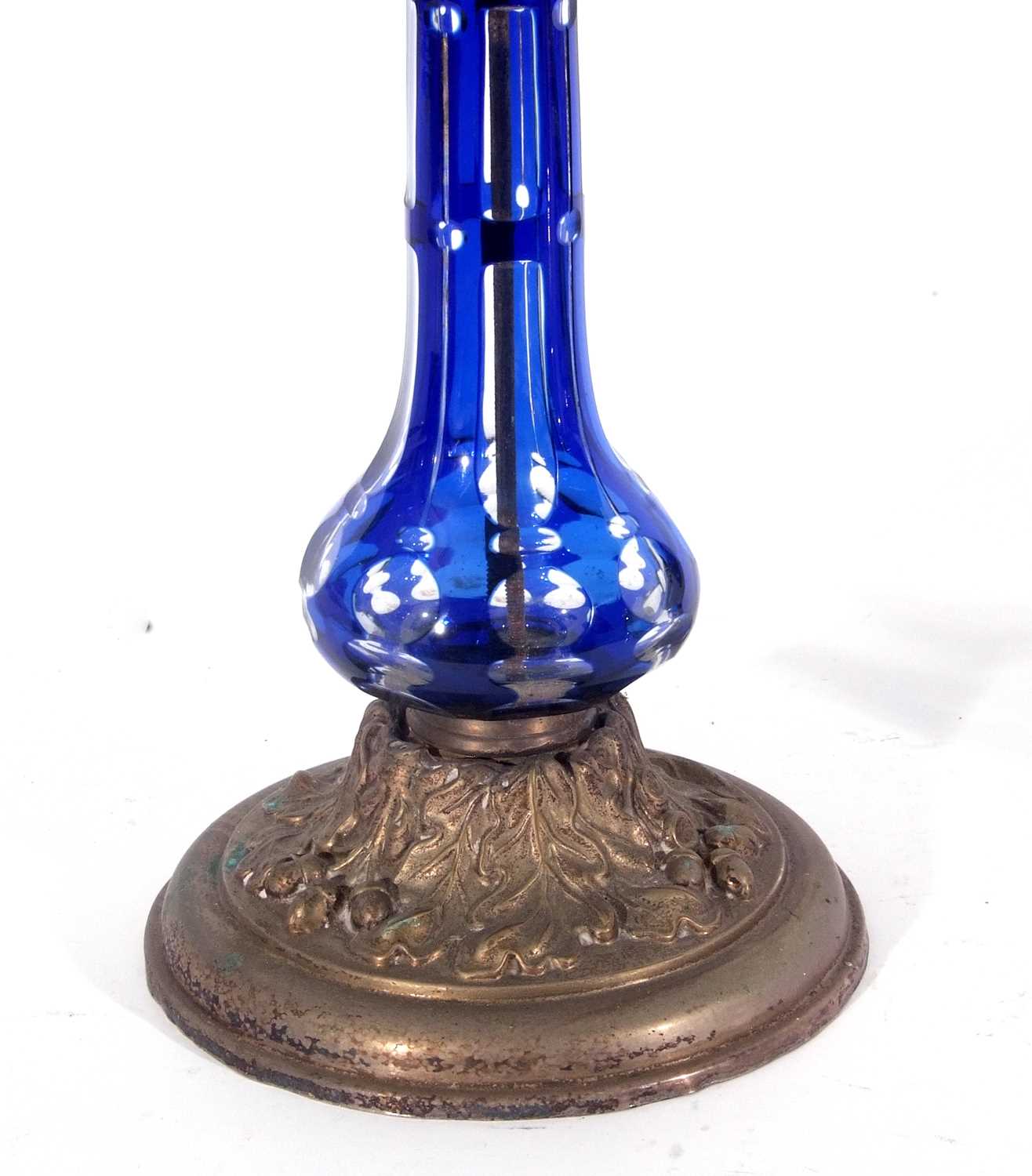 Late 19th century oil lamp, the blue glass shade with floral design above a Bohemian style blue - Image 4 of 4