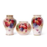 Group of three Royal Worcester vases, all decorated with blackberries, signed by Kitty Blake,