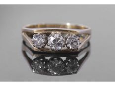 Three stone diamond ring featuring three graduated round brilliant cut diamonds, 0.50ct approx, each