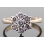 Diamond cluster ring featuring seven round brilliant cut diamonds, 0.70ct approx wt, prong set and