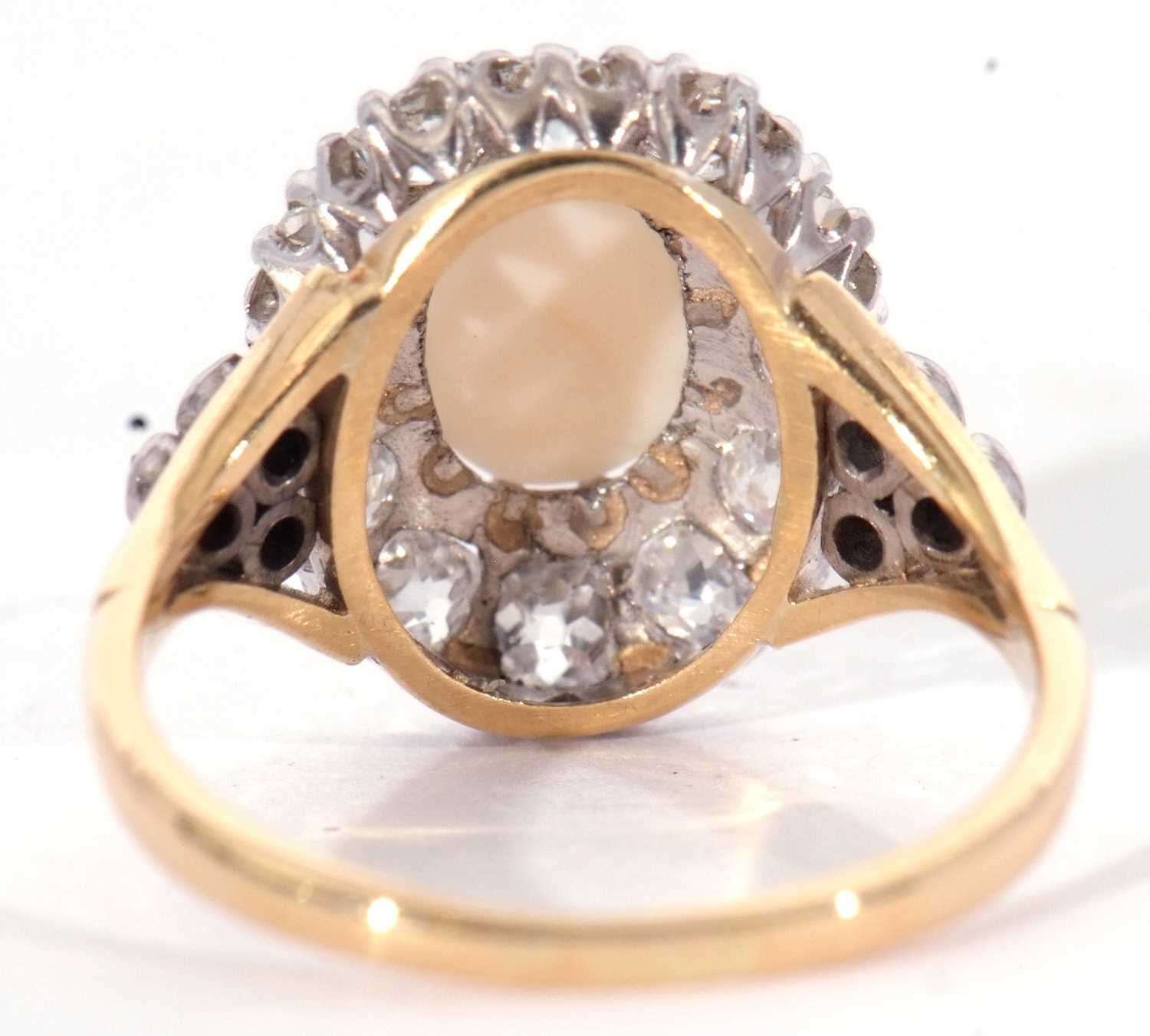 Opal and diamond cluster ring centring an oval shaped cabochon opal, multi-claw set and raised above - Image 4 of 7
