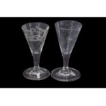 Two 18th century glasses, one with engraved design, the other clear glass (2)