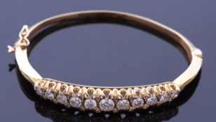 18ct gold and diamond hinged bracelet