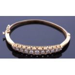 18ct gold and diamond hinged bracelet