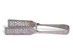 Pair of Victorian silver asparagus tongs in Old English pattern, scroll pierced blades, 21cm long,