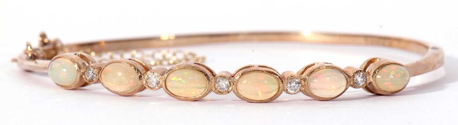 9ct gold opal and diamond set hinged bracelet, the top section with six oval cut cabochon opals, - Image 2 of 6